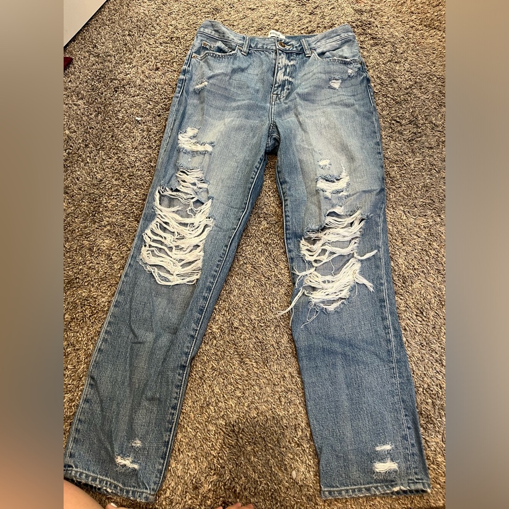 Pistols ripped jeans